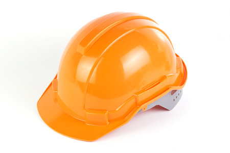 Orange safety hat isolated on white background の写真素材