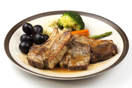 Steak of grill lamb served with vegetable/selective focus