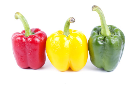 Group of color bell peppers isolated on white background.の写真素材