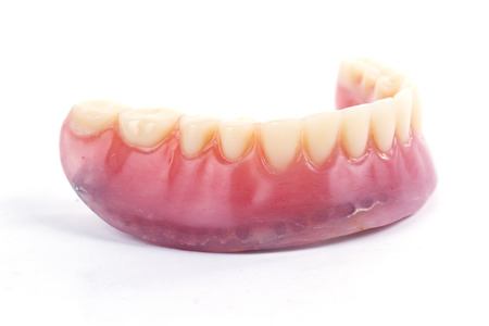 false teeth prosthetic isolated on white background