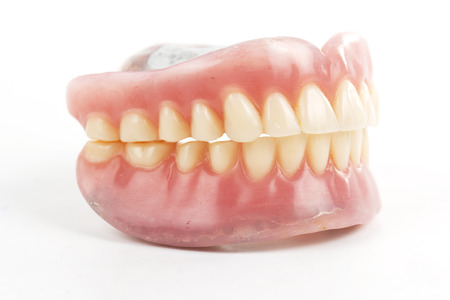 false teeth prosthetic isolated on white backgroundの写真素材