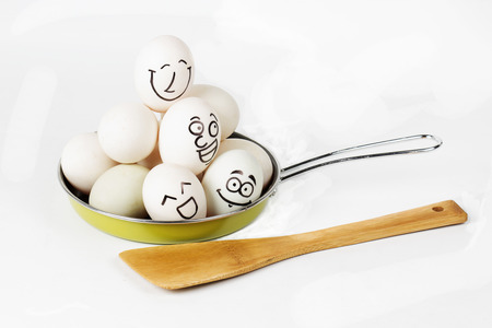 Eggs in Pan isolated on white backgroundの写真素材