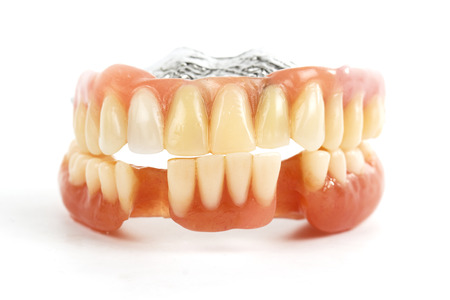 false teeth prosthetic isolated on white background