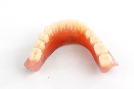 false teeth prosthetic isolated on white background