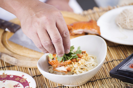 Close up hand of Chef cooking Noodle / Cooking Noodle concept