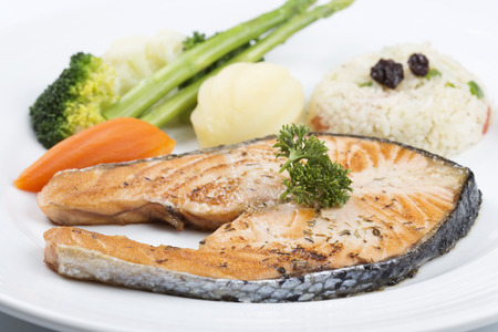 Grilled Salmon steak with Vegetables and Fried Riceの写真素材
