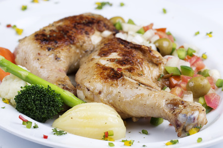 Grilled chicken steak with stir fried vegetableの写真素材