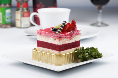 Strawberry Mousse Cake on the white Plateの写真素材