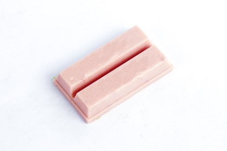 Strawberry chocolate wafer isolated on white backgroundの写真素材