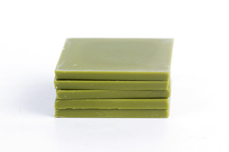 powdered green tea chocolate isolated on white background