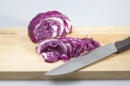 Purple cabbage  Slice of Purple cabbage on the wooden broadの写真素材