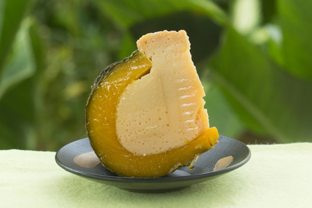 Half of Egg Custard in the pumpkin Thai dessert