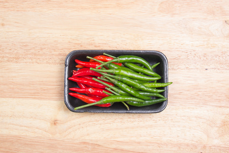 Red and Grenn Hot Chili Peppers on the tray