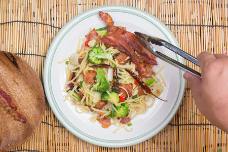 Chef decorated spicy spaghetti / cooking spicy spaghetti conceptの写真素材