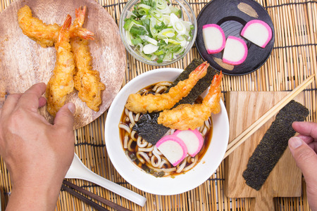 Chef decorated tempura  udon with shrimp tempura / Cooking Tempura Udon conceptの写真素材