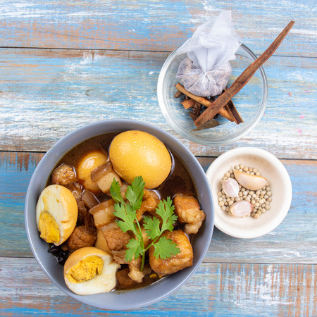 sweet brown Stewed pork gravy in bowl / Cooking sweet brown Stewed pork gravy (Moo Pa-lo) conceptの写真素材