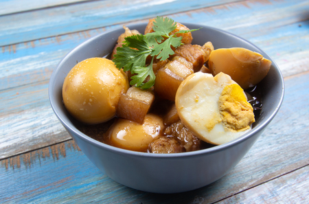 sweet brown Stewed pork gravy in bowl / Cooking sweet brown Stewed pork gravy (Moo Pa-lo) conceptの写真素材