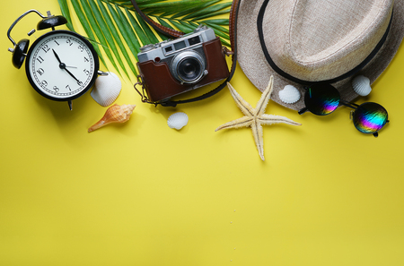 Flat Lay Traveling Holiday Vacation Yellow Background Copy Spaceの写真素材