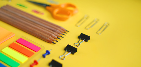 Tidy School Stationary on Yellow Background