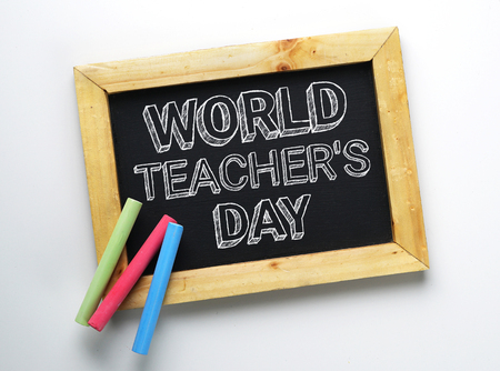 World Teacher's Day Text. Wooden Frame Blackboard with Colorful Chalkの写真素材