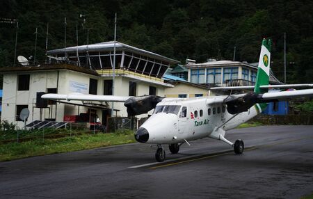 LUKLA, NEPAL - 20 SEPTEMBER 2017: Aircraft Ready to Take off on Runway at TenzingâHillary Airportのeditorial素材