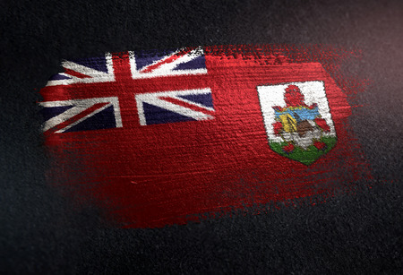 Bermuda Flag Made of Metallic Brush Paint on Grunge Dark Wallの写真素材