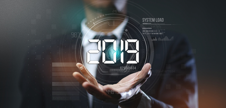Businessman Creating Futuristic Circle HUD Hologramの写真素材