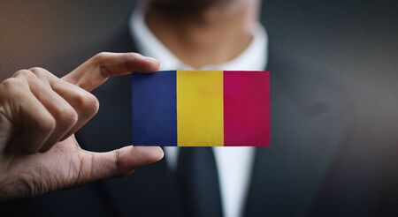 Businessman Holding Card of Chad Flagの写真素材
