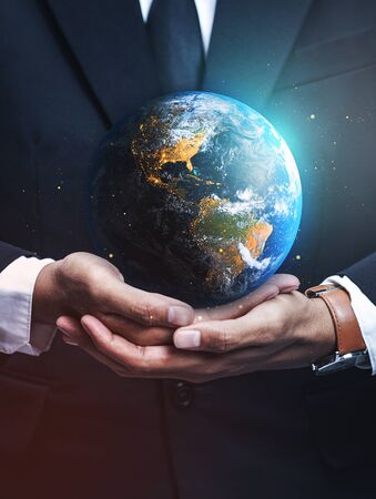 Businessman Holding Earth. Save Earth Concept.の写真素材