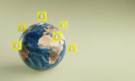 Snapchat Logo Icon Around Earth. Popular App Concept.