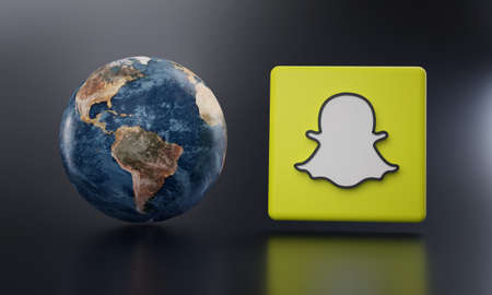 Snapchat Logo Beside Earth 3D Rendering. Top Apps Concept