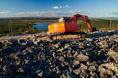 excavator on a hill