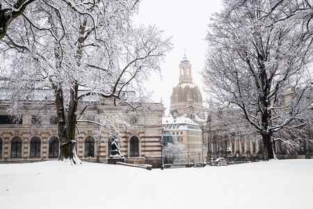 Church of our lady in Dresden seen from a snowy parkの写真素材
