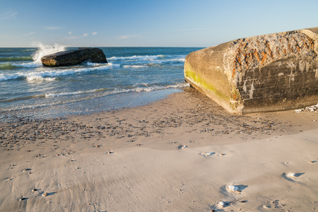 bunkers in denmark from world war II in the evening lightの写真素材
