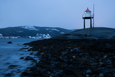lighthouse in norway in the eveningの写真素材
