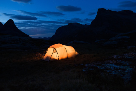 Iluminated tent in Norway at nightの写真素材