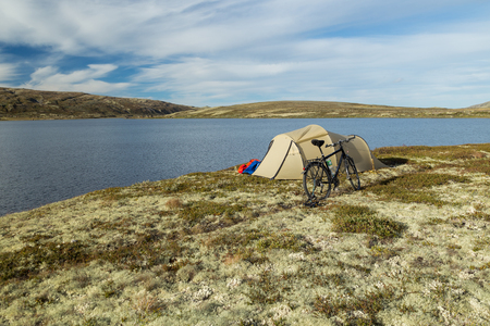Camping in Norway next to a lake in the eveningの写真素材