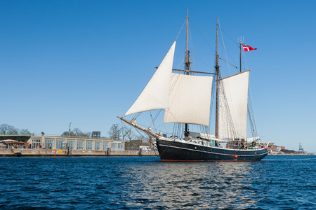 Sailboat in front of the cityscape of Copenhagen