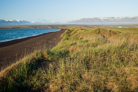 black beach near Saudarkrokur in north icelandの写真素材