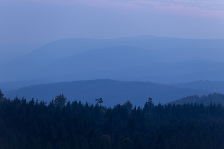 Mountain range of the Ore Mountains after sunsetの写真素材