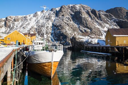 Little village Nusfjord on Lofoten islands during a sunny winter dayの写真素材