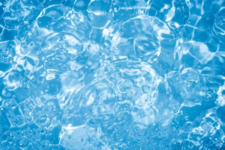 Water bubbles on blue backgroundの素材