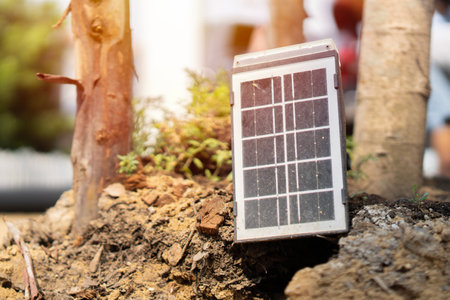 Solar-powered garden lamp in the daytime. Renewable eco energy in domestic life. Solar Powered...