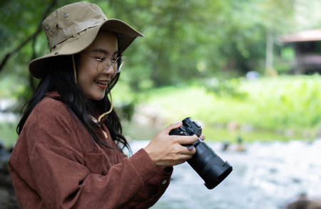 Nature, hiking and happy woman taking pictures, healthy lifestyle and wireless device. Travel...