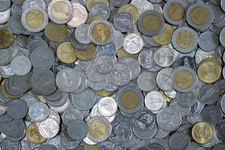 The coins is 10 baht, 5 baht,2 baht,1 baht, together.Coins background. Thai baht. Background,...