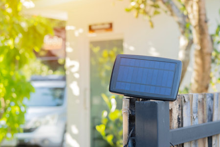 Mini electric solar cell seting on outdoor in a resort garden on a sunny day. Solar panels in home garden, selective focus on subject.の写真素材