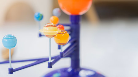 Solar system model. Kids planetarium. Little planets for kids. Astronomy fun. Science class in school. Creative educational game. Arts and crafts for children. Selective focus.の写真素材