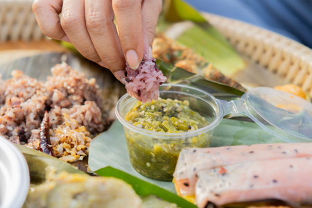 Sticky rice with Nam Prik Noom Recipe, Northern Thai Green Chili Dip is a common meal in northern Thailand.の写真素材