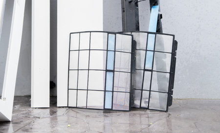 Cropped view on air filter after cleaning dust. Filtration concept. High efficiency air filter for...