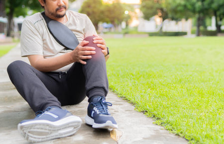 Running, workout and exercise with athlete for health, suffering and knee injury.